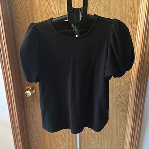 Black short sleeve woman’s shirt.size medium